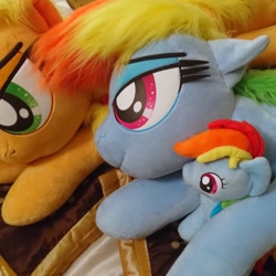 Size: 2559x2559 | Tagged: safe, artist:ponimalion, derpibooru import, applejack, rainbow dash, pegasus, pony, bed, bedroom eyes, female, freckles, hat, irl, life size, lying, lying on bed, mare, photo, plushie, sofa, sofa bed, wings