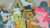 Size: 1366x768 | Tagged: safe, screencap, cloudy quartz, granny smith, igneous rock pie, pinkie pie, earth pony, pony, hearthbreakers, eyes closed, floppy ears, frown, glare, grin, pie family home, quartzrock, smiling, unamused