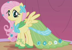 Size: 687x473 | Tagged: safe, screencap, fluttershy, pegasus, pony, suited for success, clothes, cropped, dress, female, gala dress, mare, outfit catalog, solo