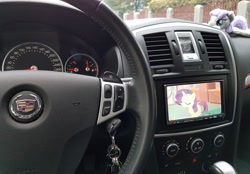 Size: 2872x2004 | Tagged: safe, maud pie, rarity, cadillac, car, irl, photo, plushie, screen, steering wheel, watching