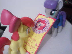 Size: 2560x1920 | Tagged: safe, apple bloom, maud pie, pinkie pie, funko, irl, maudbloom, mouth hold, photo, shipping, toy, valentine