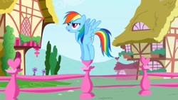 Size: 1280x720 | Tagged: safe, derpibooru import, screencap, rainbow dash, pegasus, pony, applebuck season, fence, ponyville, solo