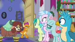 Size: 1280x720 | Tagged: safe, screencap, gallus, ocellus, sandbar, silverstream, smolder, yona, changedling, changeling, classical hippogriff, dragon, earth pony, griffon, hippogriff, pony, yak, the hearth's warming club, bow, cloven hooves, dragoness, female, hair bow, jewelry, male, monkey swings, necklace, student six, teenager