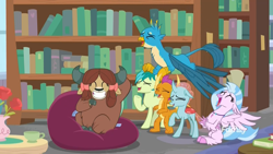Size: 1920x1080 | Tagged: safe, screencap, gallus, ocellus, sandbar, silverstream, smolder, yona, changedling, changeling, classical hippogriff, dragon, earth pony, griffon, hippogriff, pony, yak, what lies beneath, bean bag chair, book, bookshelf, bow, cloven hooves, cup, discovery family logo, dragoness, eyes closed, female, flower, flying, grin, hair bow, jewelry, laughing, library, male, monkey swings, necklace, open mouth, raised hoof, rose, school of friendship, smiling, student six, teacup