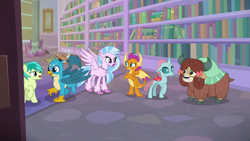 Size: 1280x720 | Tagged: safe, screencap, gallus, ocellus, sandbar, silverstream, smolder, yona, changedling, changeling, classical hippogriff, dragon, earth pony, griffon, hippogriff, pony, yak, what lies beneath, bow, cloven hooves, crossed arms, dragoness, female, hair bow, happy, jewelry, library, male, monkey swings, necklace, school of friendship, student six, teenager