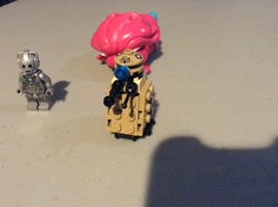 Size: 2592x1936 | Tagged: safe, artist:theanimefanz, pinkie pie, equestria girls, cyberman, dalek, doctor who, doll, equestria girls minis, irl, lego, lego dimensions, passed out, photo, shadow, table, toy