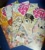 Size: 1836x2019 | Tagged: safe, derpibooru import, idw, dj pon-3, filthy rich, fluttershy, mayor mare, rainbow dash, vinyl scratch, earth pony, pegasus, pony, unicorn, spoiler:comic, spoiler:comic33, spoiler:comic46, spoiler:comic47, comic, female, glasses, glowing horn, horn, irl, magic, male, mare, microphone, photo, sign, stallion, sunglasses, telekinesis