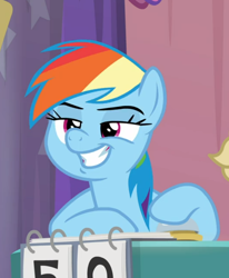 Size: 690x839 | Tagged: safe, derpibooru import, screencap, rainbow dash, pegasus, pony, a trivial pursuit, bell, cropped, faic, female, lidded eyes, mare, raised hoof, sitting, smiling, smirk, smug, smugdash, solo