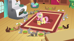 Size: 1280x720 | Tagged: safe, screencap, angel bunny, fluttershy, ferret, mouse, pegasus, pony, rabbit, rat, squirrel, putting your hoof down, animal, bowl, celery, critters, eating, female, fluttershy's cottage, fluttershy's cottage (interior), herbivore, inaccurate, mare, rodent, rug, smiling, solo