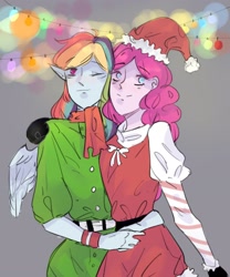 Size: 1707x2048 | Tagged: safe, artist:tar, derpibooru import, pinkie pie, rainbow dash, elf, human, bow, christmas, clothes, female, holiday, hug, humanized, lesbian, light, light bulb, looking at you, merry christmas, pinkiedash, santa claus, scarf, shipping, wings