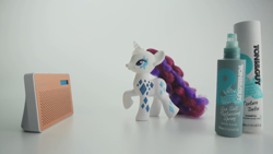 Size: 1366x768 | Tagged: safe, rarity, pony, unicorn, brushable, commercial, cutie mark magic, glamor glow rarity, hair spray, irl, live action, merchandise, photo, pop culture, radio, solo, toy, very, very (uk store)