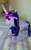 Size: 313x500 | Tagged: safe, derpibooru import, twilight sparkle, pony, unicorn, female, mare, multicolored mane, photo, purple coat, rocking horse, solo