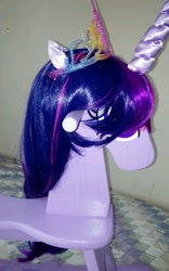 Size: 585x936 | Tagged: safe, derpibooru import, twilight sparkle, pony, unicorn, female, mare, multicolored mane, photo, purple coat, rocking horse, solo