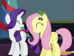 Size: 906x688 | Tagged: safe, screencap, fluttershy, rarity, pegasus, pony, unicorn, a hearth's warming tail, cute, discovery family logo, eyes closed, female, hearth's warming eve, holly, laughing, mare, mistleholly, open mouth, raribetes, shyabetes, smiling