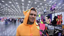 Size: 1435x813 | Tagged: safe, applejack, human, bronycon, clothes, corey graves, cosplay, costume, culture shock (wwe), irl, irl human, needs more jpeg, photo, wwe