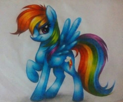 Size: 1024x851 | Tagged: safe, artist:aideemargarita, derpibooru import, rainbow dash, pegasus, pony, colored pencil drawing, looking at you, raised leg, smiling, smirk, solo, traditional art