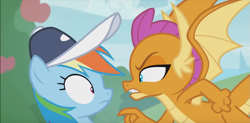 Size: 1231x606 | Tagged: safe, derpibooru import, screencap, rainbow dash, smolder, dragon, pegasus, pony, 2 4 6 greaaat, angry, brat, claws, clenched fist, coach, coach rainbow dash, duo, fangs, female, flying, gritted teeth, hat, horns, lidded eyes, mare, pointing, shrunken pupils, smolder is not amused, spread wings, teenaged dragon, teenager, wings