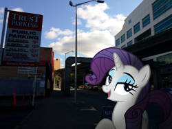 Size: 2048x1536 | Tagged: safe, artist:naijiwizard, rarity, pony, unicorn, city, dim, female, irl, looking at you, one hoof raised, open mouth, photo, photoshop, ponies in real life, seattle, smiling, solo