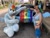 Size: 2048x1536 | Tagged: safe, artist:aphinity, artist:dolphinaphinity, derpibooru import, rainbow dash, human, bronycon, car, clothes, cosplay, costume, fursuit, irl, irl human, itasha, photo