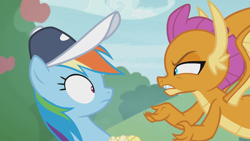 Size: 1366x768 | Tagged: safe, derpibooru import, screencap, rainbow dash, smolder, pegasus, pony, 2 4 6 greaaat, angry, cap, face to face, food, hat, outdoors, popcorn, upset, worried