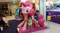 Size: 4128x2322 | Tagged: safe, derpibooru import, pinkie pie, twilight sparkle, human, equestria girls, freetheponk2016, irl, irl human, life-size pinkie statue, malaysia, my little pony logo, photo, statue, target demographic, toys r us, warning sign