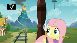 Size: 2535x1423 | Tagged: safe, screencap, fluttershy, pegasus, pony, dungeons and discords, discovery family logo, solo, train tracks, tv-y, volcano