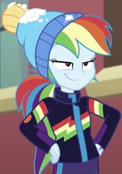 Size: 561x803 | Tagged: safe, derpibooru import, screencap, rainbow dash, better together, equestria girls, holidays unwrapped, blizzard or bust, cropped, hands on hip, rainbow dash is best facemaker, snow, solo, winter outfit