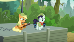 Size: 1280x720 | Tagged: safe, screencap, applejack, coloratura, earth pony, pony, the mane attraction, camp friendship, cute, filly applejack, guitar, rara, scout uniform, stage, triangle, weapons-grade cute