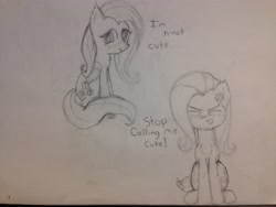 Size: 3264x2448 | Tagged: safe, artist:mranthony2, fluttershy, pegasus, pony, angry, blushing, cheek fluff, chest fluff, cute, denial, dialogue, i'm not cute, looking at you, monochrome, scrunchy face, sitting, solo, traditional art