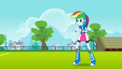 Size: 1280x720 | Tagged: safe, derpibooru import, screencap, rainbow dash, equestria girls, equestria girls (movie), boots, clothes, compression shorts, shoes, skirt, solo, wristband