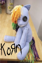 Size: 761x1132 | Tagged: safe, artist:charletothemagne, derpibooru import, rainbow dash, pegasus, pony, album cover, doll, issues, korn (album), photo, plushie, ragdoll, solo, toy