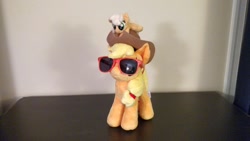 Size: 1024x576 | Tagged: safe, artist:shadymacro, applejack, 4de, appletini, duality, irl, photo, plushie, sunglasses