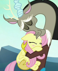 Size: 704x856 | Tagged: safe, screencap, discord, fluttershy, draconequus, pegasus, pony, to where and back again, blush sticker, blushing, cropped, cute, discute, eyes closed, female, floppy ears, hug, male, mare, shipping fuel, shyabetes, smiling