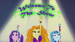 Size: 1920x1080 | Tagged: safe, screencap, adagio dazzle, aria blaze, sonata dusk, equestria girls, rainbow rocks, female, lights, raised arm, the dazzlings, title card, trio, trio female, welcome to the show, youtube link