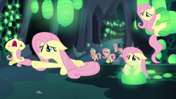 Size: 1920x1080 | Tagged: safe, screencap, fluttershy, changeling, pegasus, pony, to where and back again, changeling hive, crying, crying flutterlings, cute, dilated pupils, disguise, disguised changeling, fake fluttershy, floppy ears, frown, nose in the air, open mouth, prone, sad, sitting, volumetric mouth