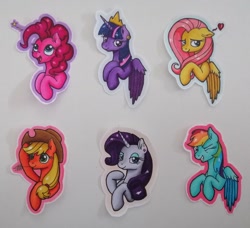 Size: 3126x2849 | Tagged: safe, artist:serenepony, derpibooru import, applejack, fluttershy, pinkie pie, rainbow dash, rarity, twilight sparkle, twilight sparkle (alicorn), alicorn, earth pony, pegasus, pony, unicorn, badge, con badge, concept art, mane six, photo, traditional art