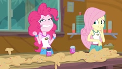 Size: 1187x675 | Tagged: safe, screencap, fluttershy, pinkie pie, equestria girls, legend of everfree, legend of everfree - bloopers, clothes, dough, faic, food, grin, needs more jpeg, sleeveless, smiling, sprinkles, tanktop, wat, wtf