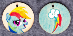 Size: 1014x507 | Tagged: safe, artist:malte279, derpibooru import, rainbow dash, pegasus, pony, craft, cutie mark, jewelry, pendant, traditional art, wood