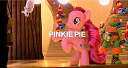 Size: 1351x721 | Tagged: safe, screencap, pinkie pie, pony, brushable, commercial, guy diamond, irl, lego, michelangelo, photo, pony reference, rearing, target (store), teenage mutant ninja turtles, text, the toycracker, toy, toy soldier, trolls, youtube link