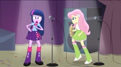 Size: 2048x1145 | Tagged: safe, derpibooru import, screencap, fluttershy, twilight sparkle, twilight sparkle (alicorn), alicorn, equestria girls, rainbow rocks, choking, face, lol, musical instrument, tambourine