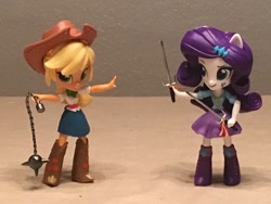 Size: 1024x768 | Tagged: safe, artist:mayorlight, applejack, rarity, equestria girls, clothes, doll, equestria girls minis, eqventures of the minis, flail, sai, skirt, toy, weapon