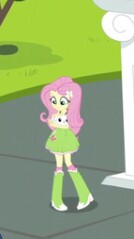 Size: 134x239 | Tagged: safe, screencap, angel bunny, fluttershy, equestria girls, friendship games, boots, clothes, cropped, petting, picture for breezies, skirt, smiling, socks