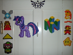 Size: 2932x2212 | Tagged: safe, artist:vickyviolet, derpibooru import, twilight sparkle, a link to the past, link, logo, luma, mario, navi, nintendo, nintendo 64, perler, perler beads, photo, princess peach, princess zelda, super mario bros., super mario galaxy, the legend of zelda, triforce