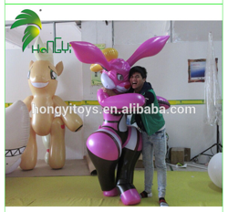 Size: 627x581 | Tagged: safe, applejack, human, rabbit, bootleg, hongyi, inflatable, irl, irl human, photo