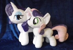 Size: 1280x889 | Tagged: safe, artist:peruserofpieces, rarity, sweetie belle, unicorn, comparison, duo, female, filly, happy, horn, irl, lidded eyes, mare, photo, plushie, profile, siblings, side by side, sisters, smiling, toy