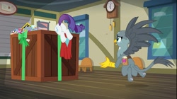 Size: 962x540 | Tagged: safe, screencap, gabby, rarity, griffon, pony, unicorn, dragon dropped, box, butt, clock, face down ass up, plot, post office, ribbon