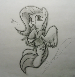 Size: 1050x1080 | Tagged: safe, artist:chickensteve, fluttershy, pegasus, pony, clothes, grayscale, hoodie, looking at you, monochrome, on side, simple background, smiling, solo, traditional art