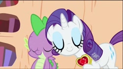 Size: 1280x720 | Tagged: safe, screencap, rarity, spike, dragon, pony, unicorn, secret of my excess, bookshelf, cute, cutie mark, eyes closed, eyeshadow, female, fire ruby, gem, golden oaks library, hub logo, jewelry, makeup, male, mare, necklace, nuzzling, ruby, shipping fuel, spikelove