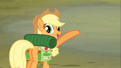 Size: 1100x618 | Tagged: safe, screencap, applejack, earth pony, pony, sleepless in ponyville, backpack, female, freckles, mare, open mouth, raised hoof, solo