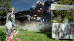 Size: 1136x640 | Tagged: safe, pinkie pie, pony, clash of hasbro's titans, commercial, commercial reference, house, irl, lemonade stand, live action, optimus prime, photo, playground, plushie, pony cameo, pony reference, schick hydro, towel, toy, transformers, transformers the last knight, tree, upside down